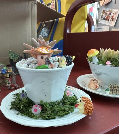 Photograph of two finished Teacup Fairy Gardens