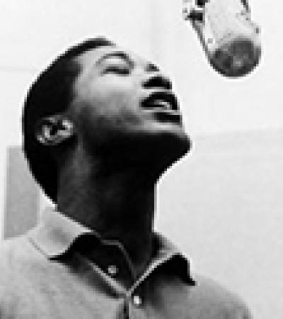 Sam Cooke singing into a microphone (Library of Congress)