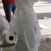 A child being wrapped like a mummy from one of the "Minute to Win it" Games)