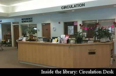 The circulation desk inside the library