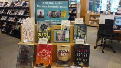 Library display with books for an author visit