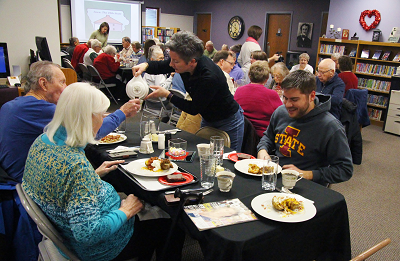 Patrons eat together at a Soup and Sound program