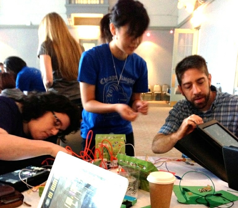 Teenagers working with electronics