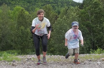 Author and son at Run or Dye in 2014