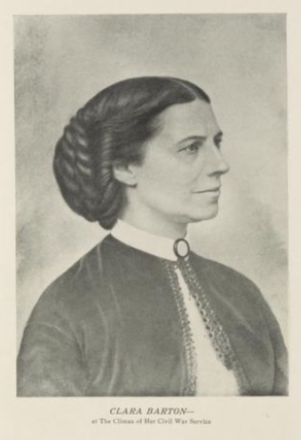 A black and white photograph of a woman