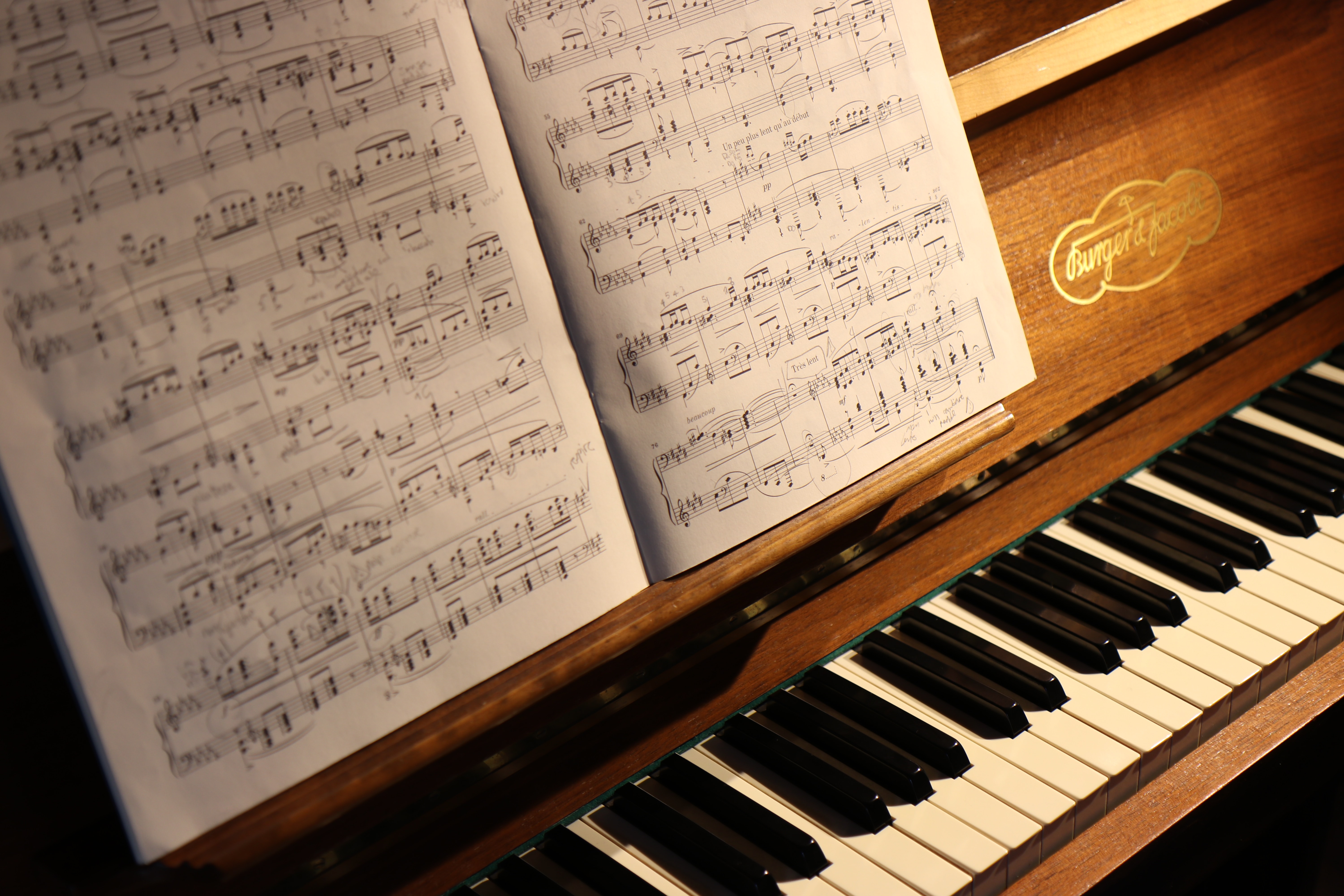 Photograph of a piano with sheet music 