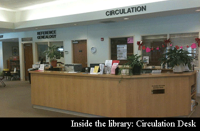 The circulation desk inside the library