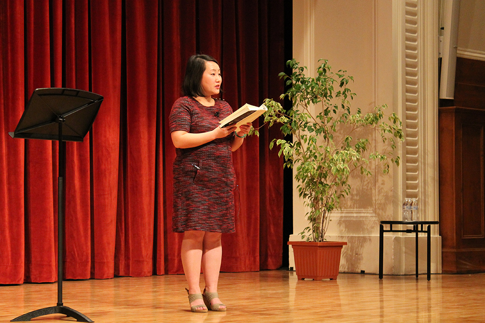 Author Kao Kalia speaking on a stage