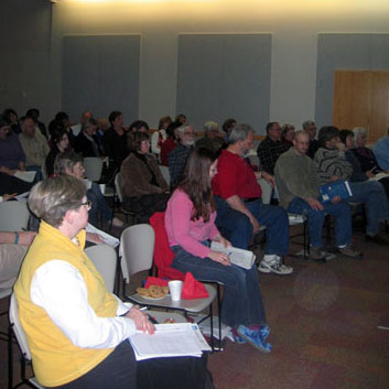 Community members attend “Understanding and Responding to Poverty Among Children and Their Families in Johnson County” at the Johnson County Library in Overland Park, Kansas