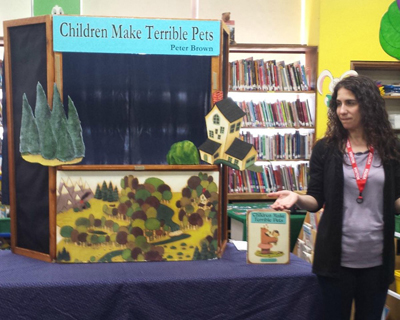 Puppet show led by librarian