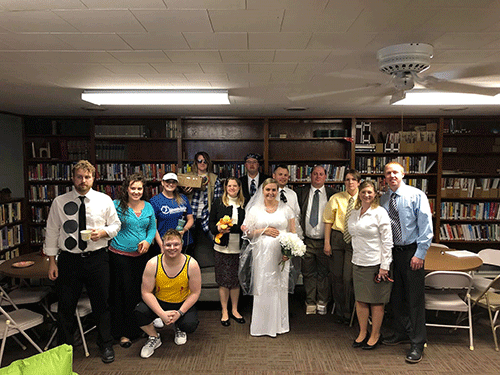 Group of people dressed up as characters from the TV show The Office