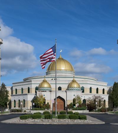 Islamic Center of America mosque with American flag in front