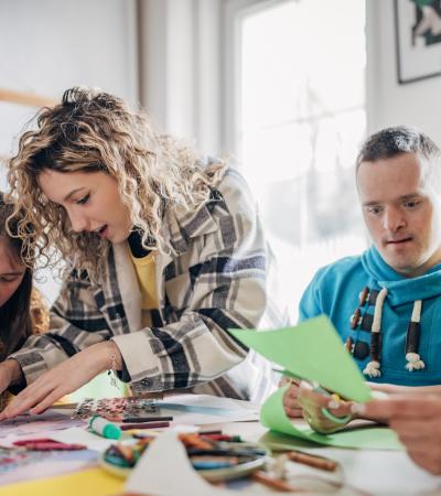 Photograph of people doing an art project 