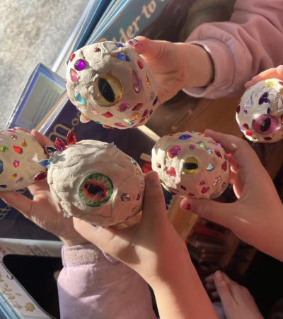 Finished clay dragon eggs covered in beads