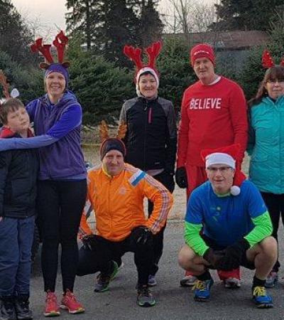 A group of runners outdoors for the LP Fisher Public Library's Reindeer Run