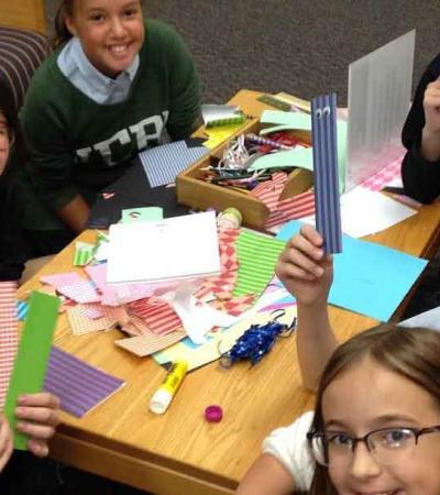 Girls making bookmarks