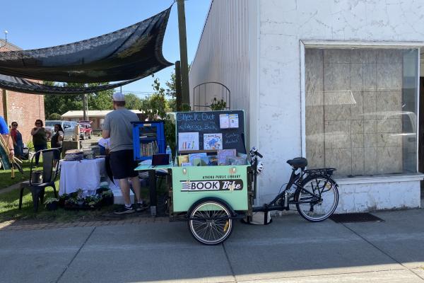 Photograph of the book bike at the Farmers Market