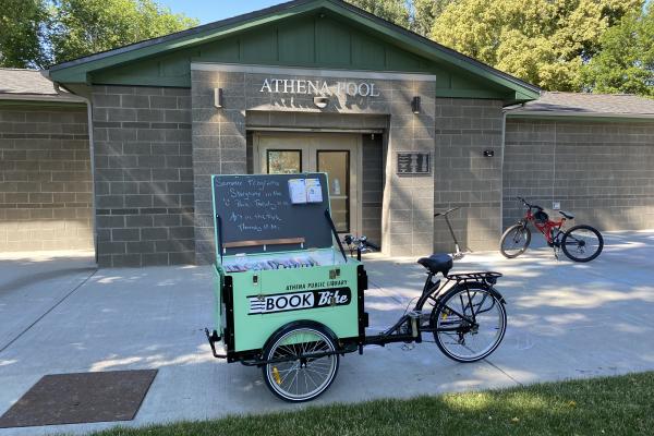 Photograph of the book bike at the local pool.
