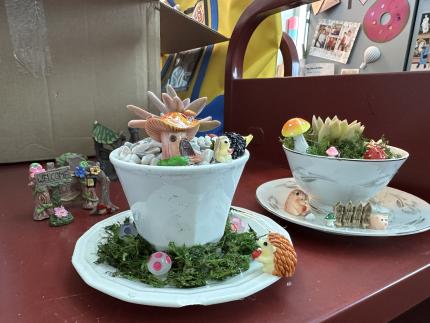 Photograph of two finished Teacup Fairy Gardens