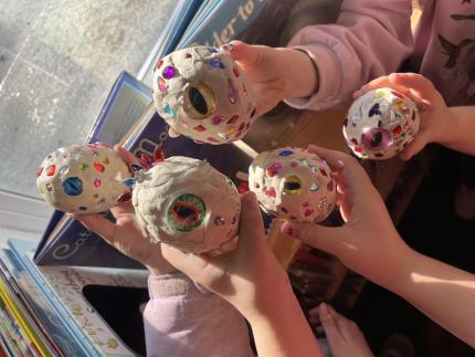 Finished clay dragon eggs covered in beads