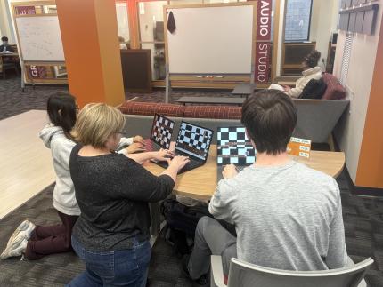 Students at a laptop