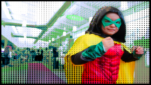 Photo of child dressed as a superhero.