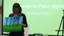 Becky O'Neil talks about her painting at the beginning of the event Becky O'Neil talks about her painting at the beginning of the event