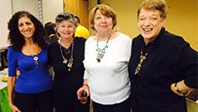 Creative Aging program participants show off their reclaimed jewelry. Creative Aging program participants show off their reclaimed jewelry.
