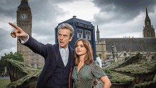 The Doctor and Clara look out across a park as the TARDIS and Big Been loom behind them (Image courtesy of the BBC)