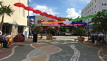 A Little Havana walkway is decorated with upside down umbrellas. 