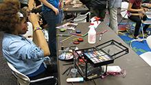 Teen girl learns to apply special effects makeup Teen girl learns to apply special effects makeup