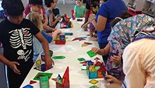 Kids playing with Magna-Tiles Kids playing with Magna-Tiles
