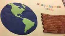 Build a Better World Build a Better World Globe and brick wall