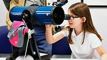 Thumbnail image of FV Star Party 2 Young girl looks through a telescope