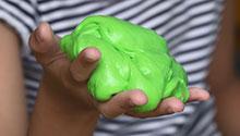Child holding slime