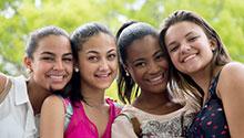 Group of teenage girls smiling