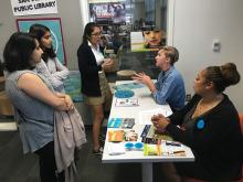 Two librarians talk to three young women about the dangers of sex trafficking. Two librarians talk to three young women about the dangers of sex trafficking.