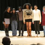 Six students perform at the World on the Move Poetry and Spoken Word event