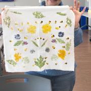 A program participant displays finished flower dye