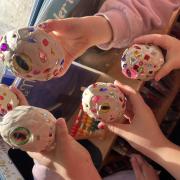 Finished clay dragon eggs covered in beads