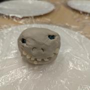 Creepy clay face
