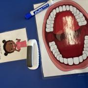 A photograph of the teeth brushing station.