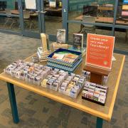 Photo of the tiny library, lots of tiny books on display