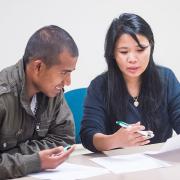 Nepali and Burmese-speaking patrons learn about financial literacy.