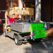 Back of decorated golf cart for bookmobile