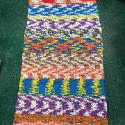 A finished, patterned mat
