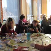 Patrons work on constructing their vision boards.