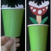 Solo green cup with piranha plant inside