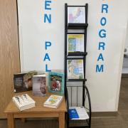 Photograph of library display: "Pen Pal Program" with a display of New Zealand books