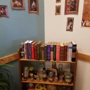 Shelves of books and potions
